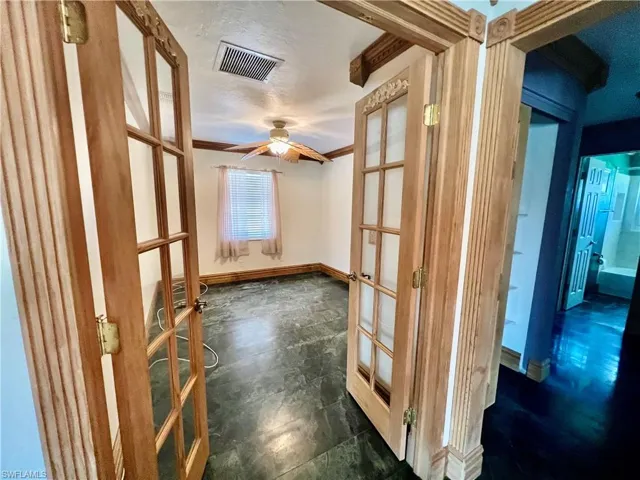 French doors to third bedroom.