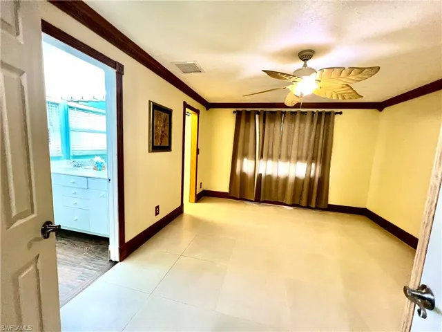Primary bedroom with walk in closet and private ensuite bath.