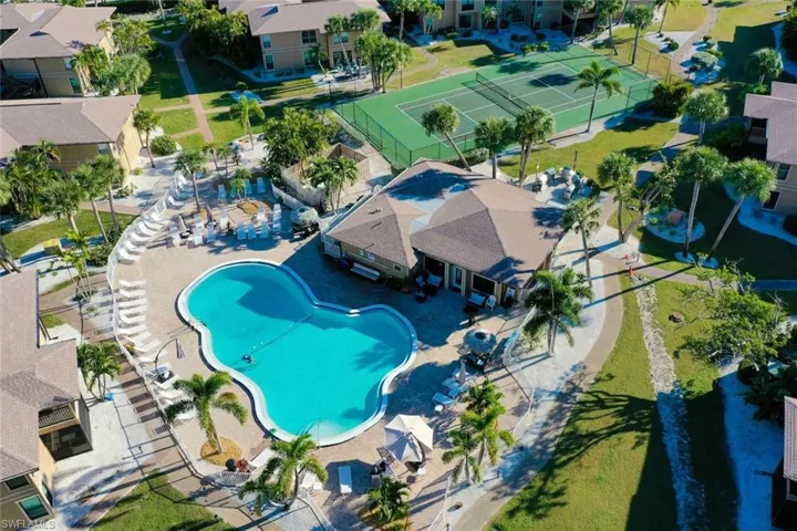 Aerial view of residential area with a pool area
