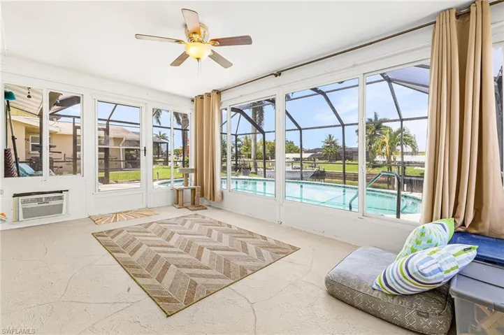 Air conditioned sunroom with easy access to pool area