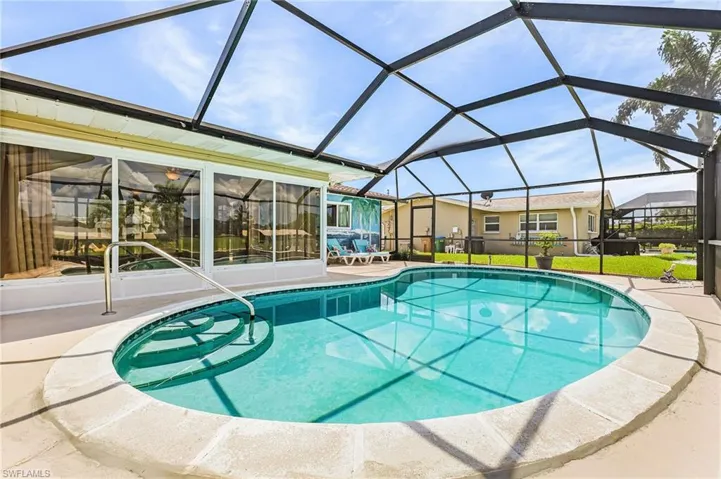 Fun in the Sun with newer pool cage and western exposure