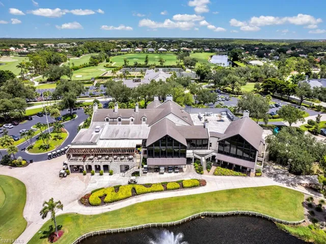 Aerial view of a golf course and a large body of water