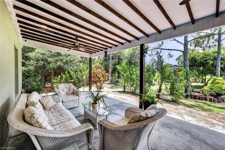 View of patio / terrace with ceiling fan and outdoor lounge area