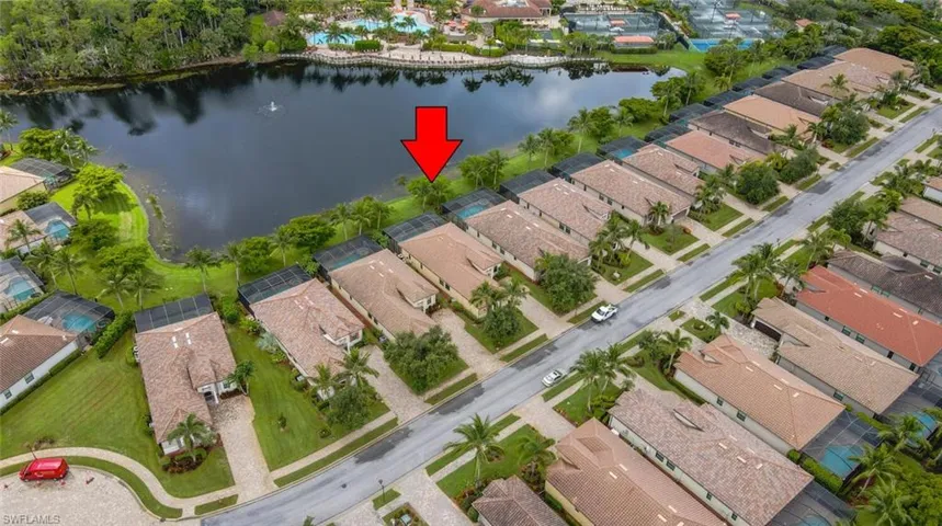 Bird's eye view with a water view and a residential view