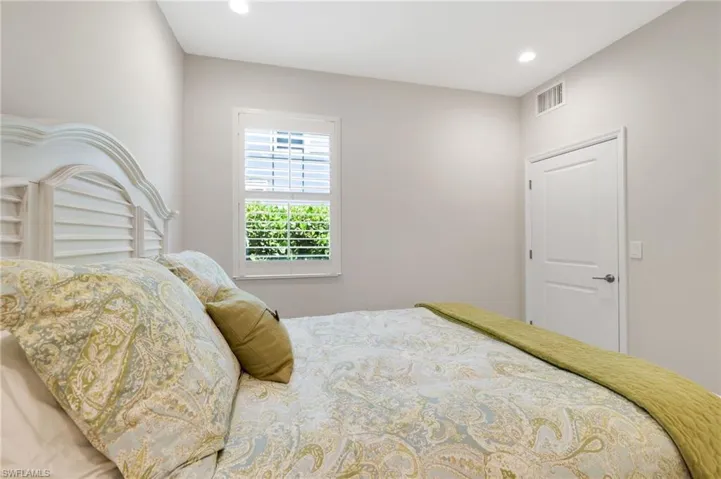 Bedroom featuring recessed lighting