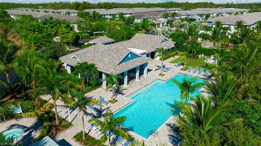 Community pool featuring a patio area