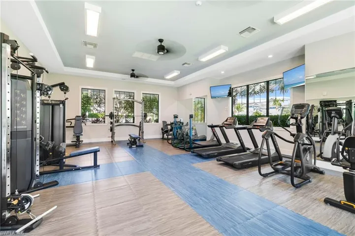 Fitness center featuring ceiling fan