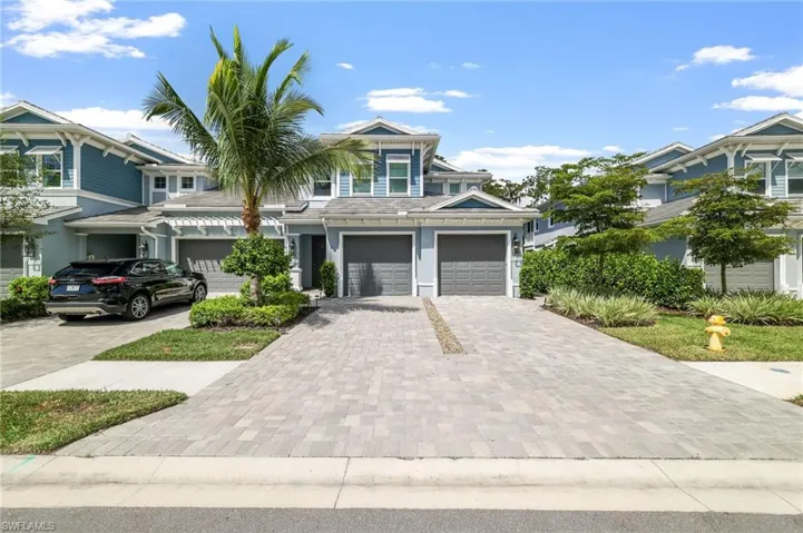 View of front facade featuring decorative driveway