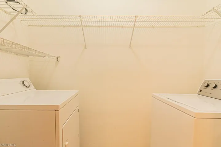 Laundry area featuring washing machine and dryer