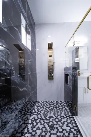 Bathroom featuring an enclosed shower