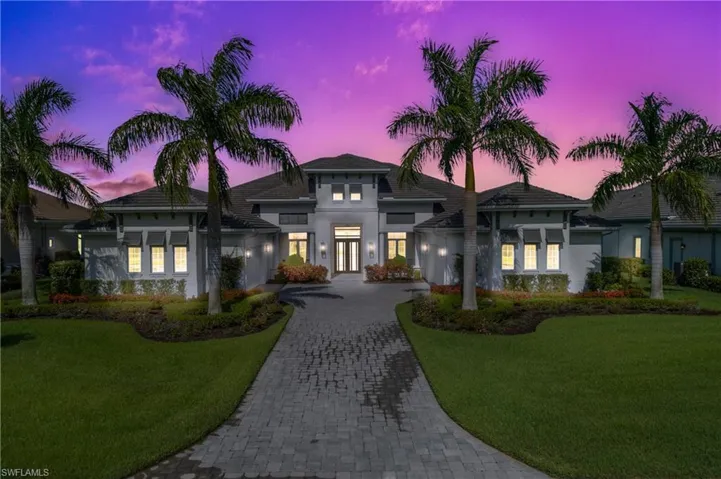 This SW facing home is a former model home and is simply stunning!