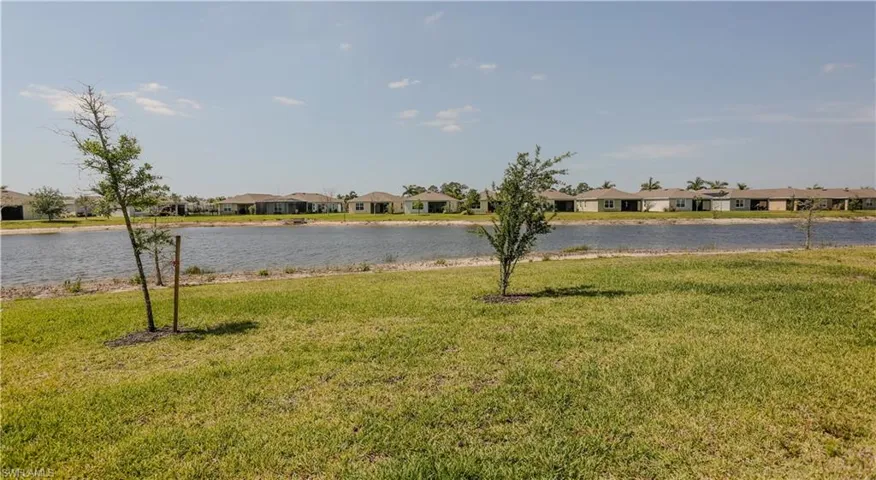 Water view featuring nearby suburban area