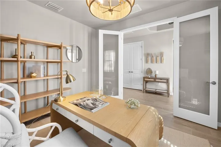 Office area featuring wood finished floors