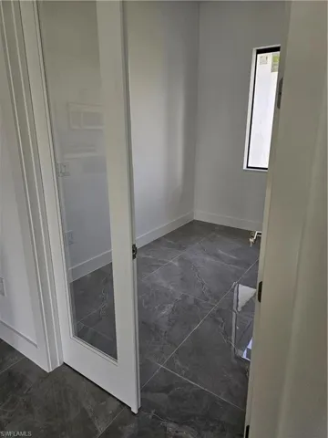 View of tiled empty room