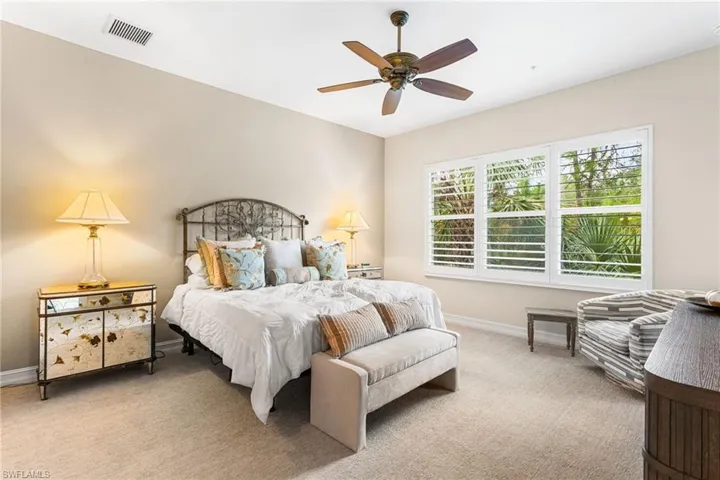 Bedroom with carpet floors and ceiling fan