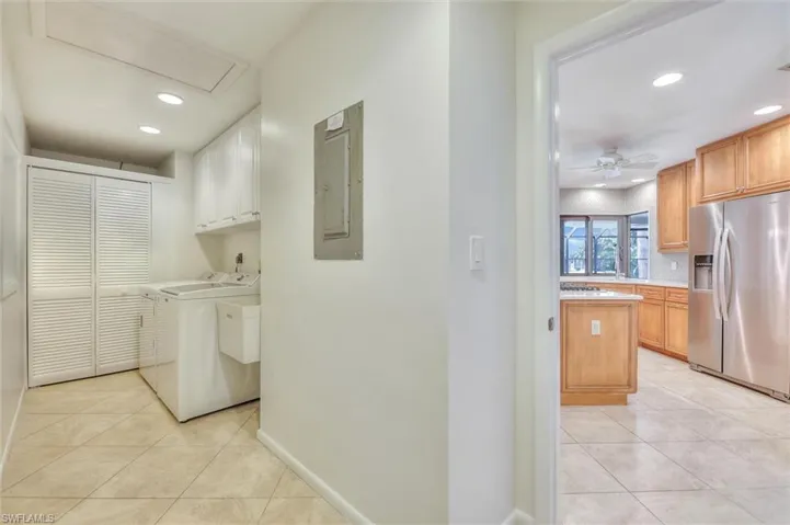 Kitchen with ceiling fan, stainless steel appliances, recessed lighting, light countertops, and light tile patterned flooring