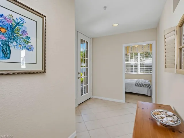 The bright, tiled foyer creates a welcoming first impression and introduces the home’s easy, single-level layout.