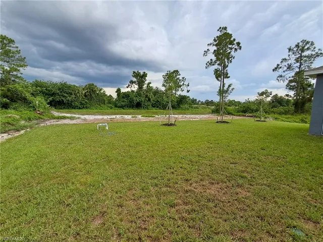 View of community with a yard