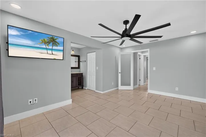 Light gray walls with recessed lighting