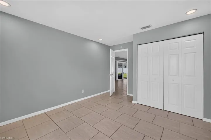 Recessed lighting and ceramic tile flooring