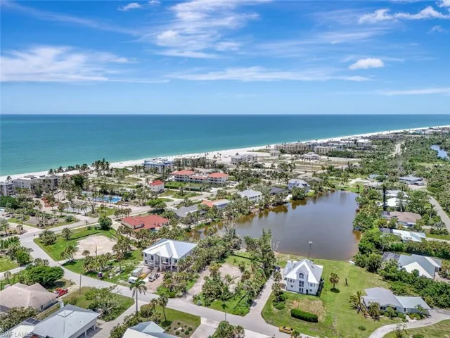Aerial view of residential area with a nearby body of water