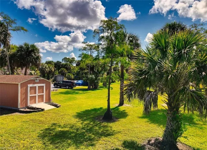 View of yard featuring a storage shed
