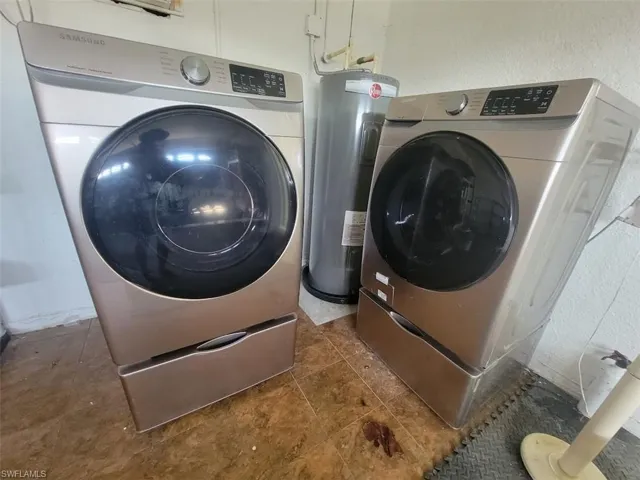 Samsung Washer & Dryer & Hot Water Heater in Garage
