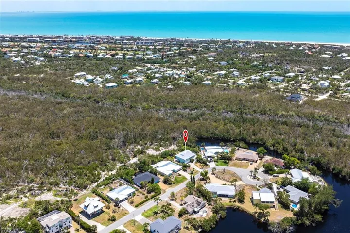 Bird's eye view with a residential view and a water view