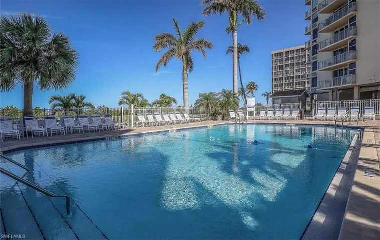 Community pool featuring a patio area