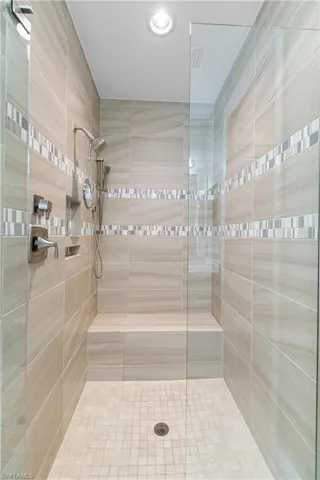 Bathroom with a tile shower