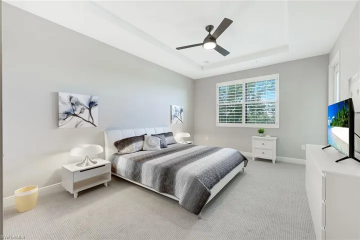 Large primary bedroom with walk in closet and large ensuite.