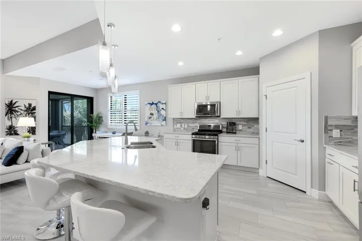 Tons of cabinet space AND a LARGE walk in pantry!