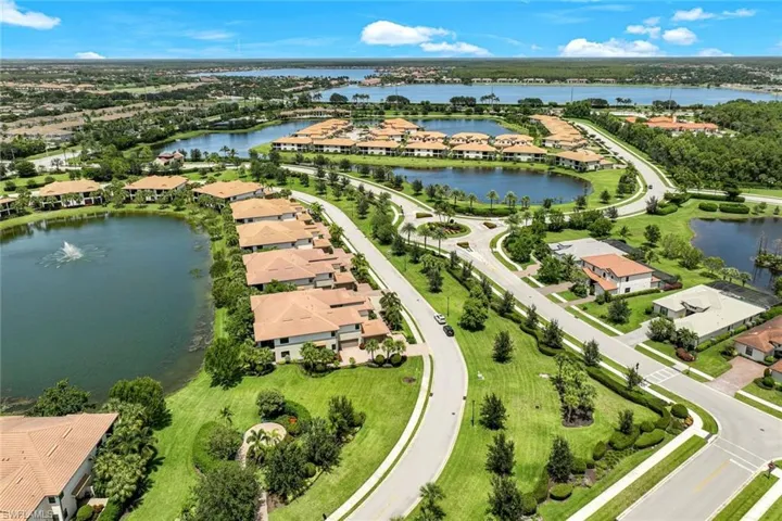 Sweeping aerial with lakes and green space.