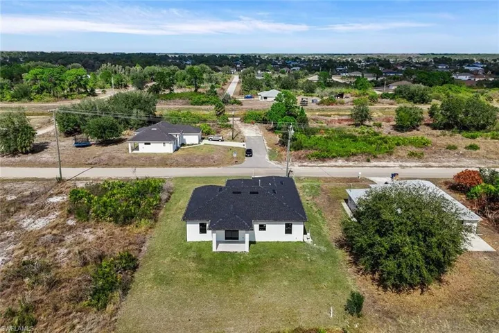 Aerial view of property and surrounding area