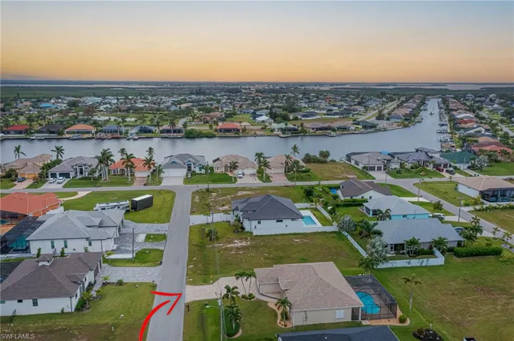 Aerial view at dusk with a water view