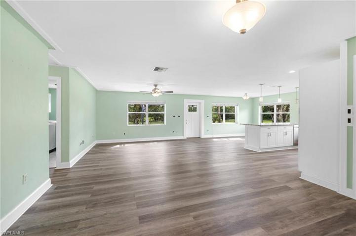 The view of half of the living/family room from the dining area