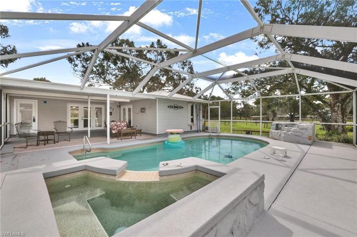 A tropical oasis with a hot tub