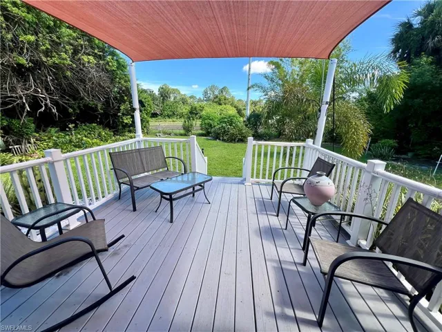 Wooden deck featuring a yard