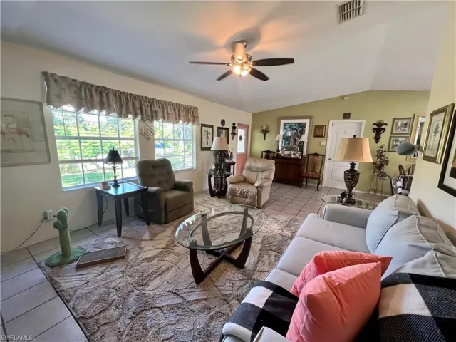 Tiled living room with ceiling fan