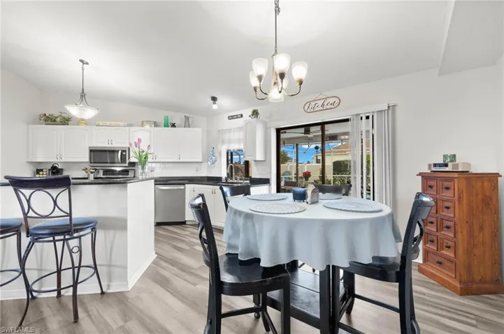 Eat in kitchen walks out to lanai through sliding glass doors