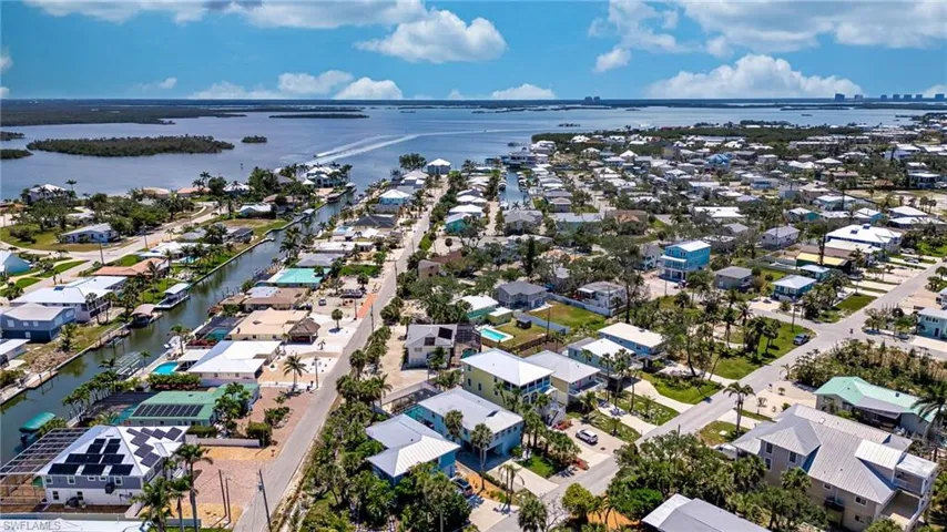 Aerial view of residential area with a large body of water