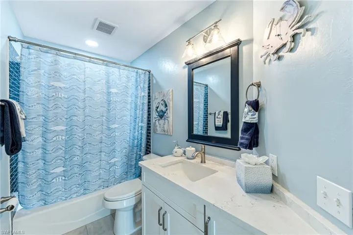 Guest  Bathroom with custom vanity and Quartz countertop