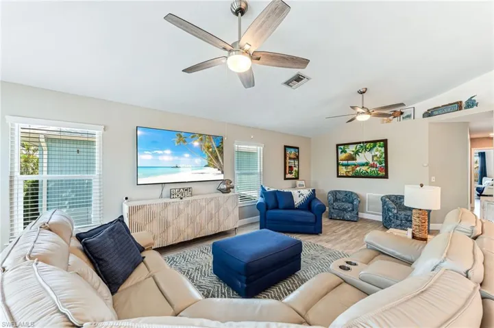 Spacious living room with lots of natural sunlight.