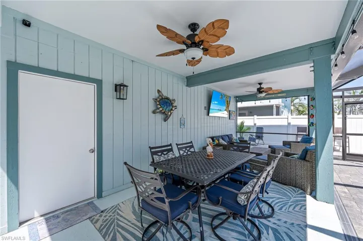 View of patio / terrace with outdoor lounge area, a ceiling fan, outdoor dining space, and fence