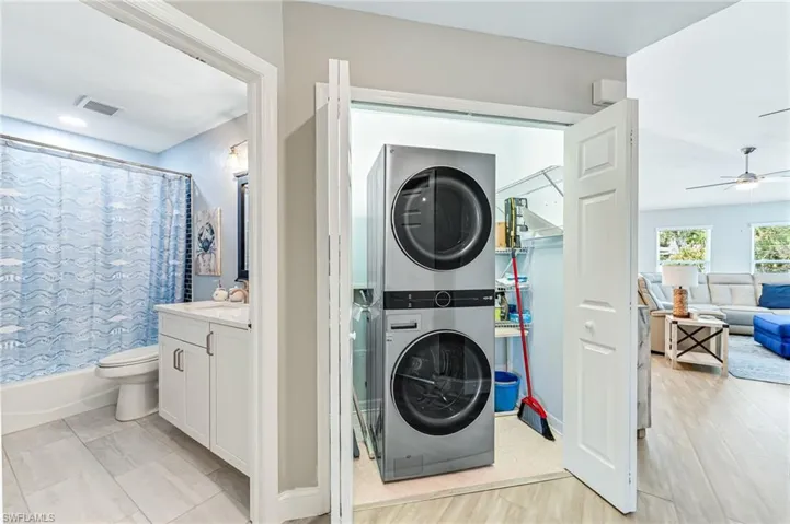 Stacked LG washer and dryer conveniently located