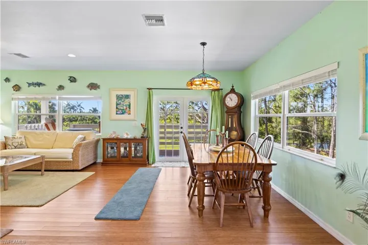 Walls of windows!  Beautiful flooring, clean and simple lines - truly a gorgeous home both inside and out!