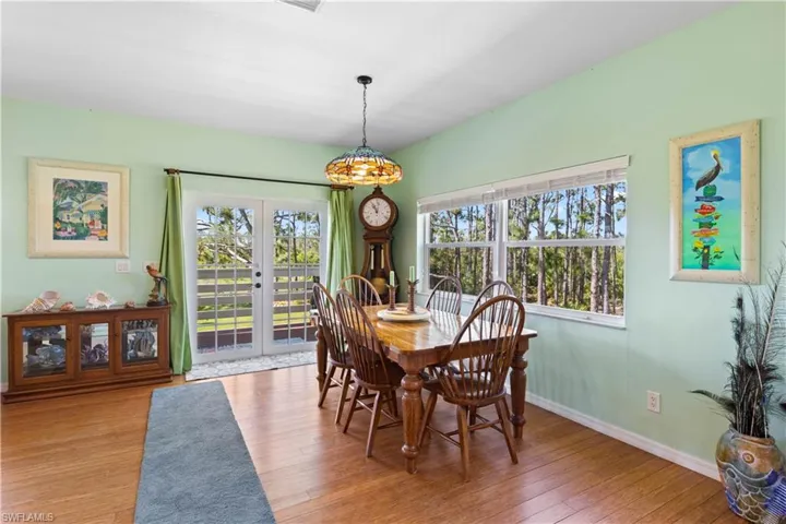 You will feel like you are dining amongst the trees!  A beautiful glass chandelier is the centerpiece of the dining area - there is also plenty of space for a china cabinet/buffet server!