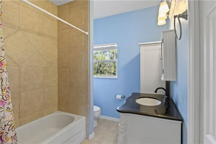 Guest bathroom has been updated and offers a bath/shower combo along with plenty of storage!