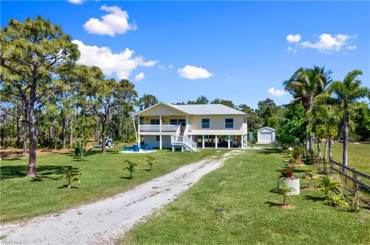 Picteresque perfection! Pure curb appeal!  A long driveway welcomes you with beautiful landscaping and a GORGEOUS home!