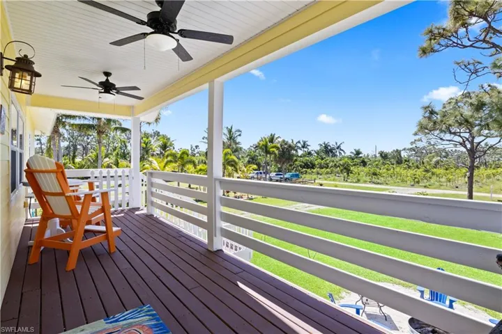 A beautiful front porch retreat to enjoy some coffee or wine and enjoy the paradise we live in!  Home was recently repainted and roof is newer - nothing to do here but move in and enjoy!